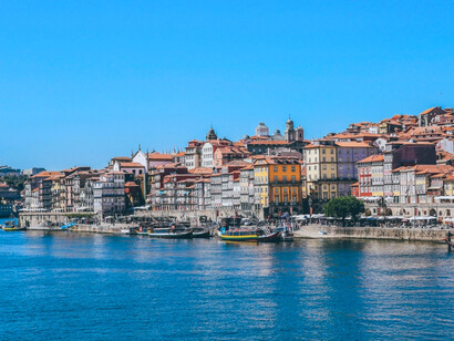 A panoramic view of Lisbon by the sea, representing how the journey ended with reflection rather than regret