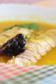 Soup of mantis shrimp, yellow tomatoes, blackberries and leaves of mustard, by Michele Biagiola