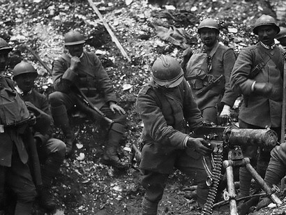 Italian troops during the Seventh Battle of the Isonzo, posing with a captured Austrian machine gun, World War I