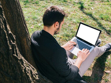 Struggling to find direction, a young adult searches for job opportunities online, caught between uncertainty and the desire for meaningful work