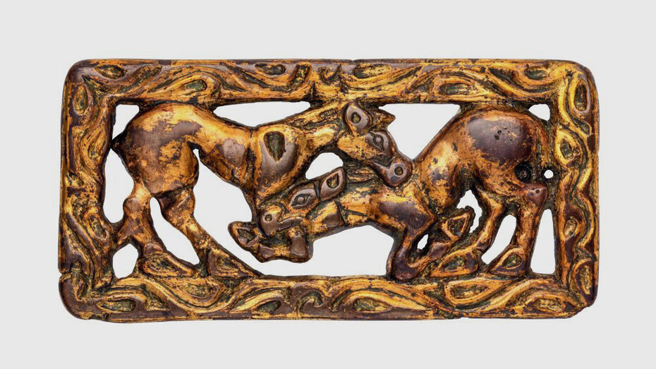 Belt buckle depicting two fighting horses. Courtesy of The Museum of Fine Arts