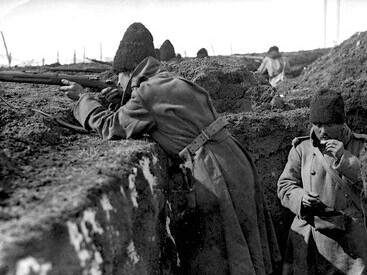 Romanian soldiers in trenches during World War I, facing the harsh realities of frontline warfare