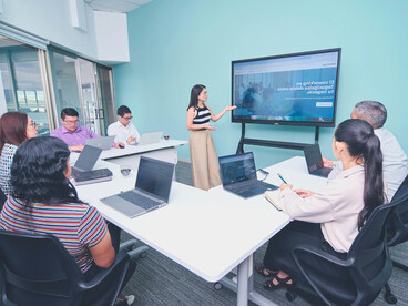 Business meeting in a modern office focusing on development and training