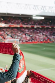In Liverpool, England, United Kingdom, crowds gathered to watch the soccer game with passion and pride
