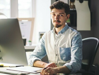 A man immersed in remote work, reflecting the challenges of prolonged screen time