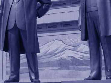 Bowing to the strongmen Kim Il Sung and Kim Jong Il