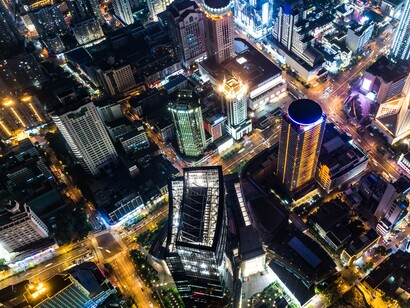 Crowded streets and endless lights, a modern constellation shaped more by vanity than by awe