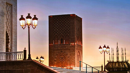 The Hassan Tower captured in sunset hues, symbolizing Morocco’s timeless architectural legacy