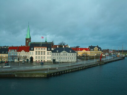 Helsingør’s waterfront, where historic civic buildings line the Øresund Strait, facing Sweden across one of northern Europe’s narrowest crossings