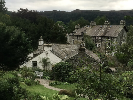 The rear view of Dove Cottage in Grasmere, Cumbria, UK, the former home of poet William Wordsworth and a central landmark of the Romantic literary movement