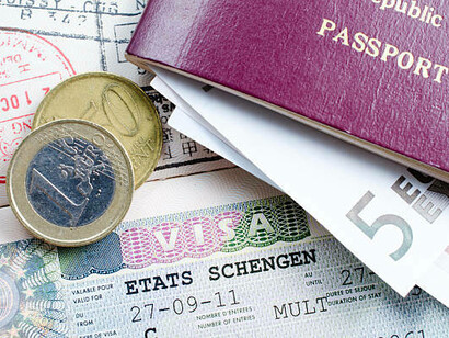 A Schengen visa and passport photo, representing the European Union and the Schengen Area