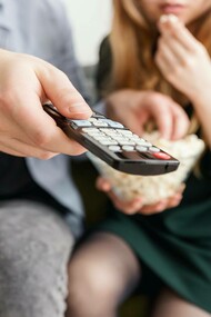 A couple watching a movie: travelling through cinema