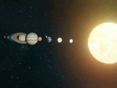 A view of the solar system with planets orbiting the Sun under a dark cosmic sky