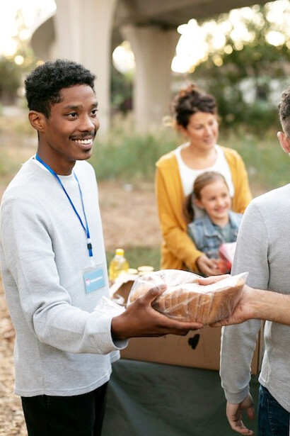 Through acts of kindness, volunteers collect food donations, lend helping hands, and bring people together in support and compassion