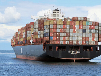 During the day, a cargo ship is seen moored at the harbour