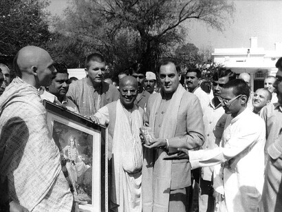 Indian Prime Minister Rajiv Gandhi receives a Russian-language copy of Bhagavad Gita As It Is from Soviet Hare Krishnas in New Delhi, 1989