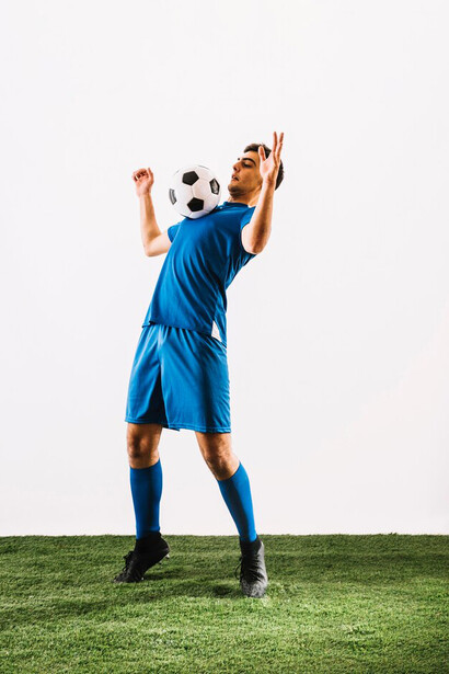 A football player catching ball on chest