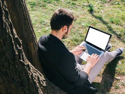 Struggling to find direction, a young adult searches for job opportunities online, caught between uncertainty and the desire for meaningful work