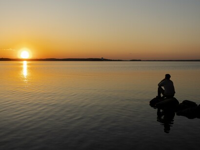 As the sun meets the horizon, thought dissolves and only stillness remains