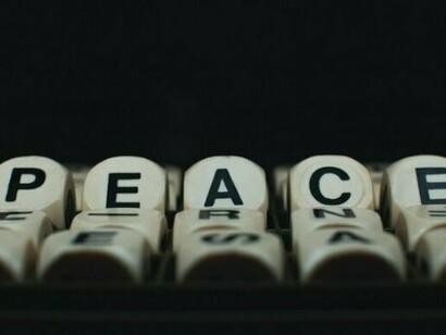 A Boggle game spelling "peace," reflecting the need of the hour in our contemporary world