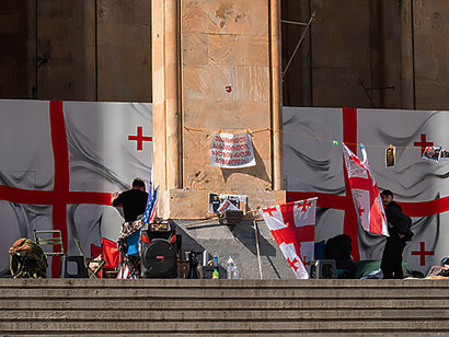 Protesters gather outside the Georgian parliament in Tbilisi, Georgia