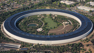 Aerial view of Apple Park, Apple Inc.’s corporate headquarters in Cupertino, California. Its rooftop is lined with solar panels generating 17 MWp, making it one of the largest solar roofs in the world. This photo was taken from a Cessna 172M