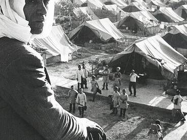 UNRWA-administered tented camp near Damascus offered temporary shelter to approximately 3,200 Palestinian Arab refugees. Following the June 1967 hostilities in the Middle East, 117,500 people were displaced from the Quneitra region of Syria, which was occupied by Israel. Among them were 17,500 Palestinian refugees registered with UNRWA