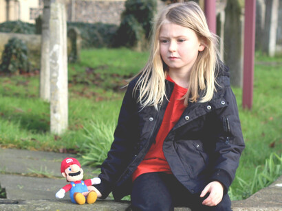 A child experiencing poverty in St. Lawrence, Ramsgate, UK, highlighting the urgent need for addressing financial inequality and its impact on opportunities