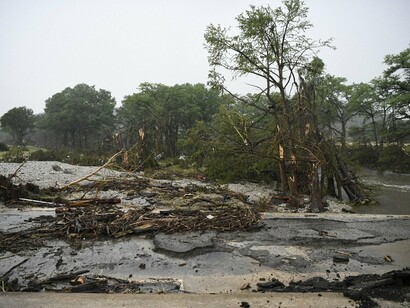 Flooded roads and broken trees are the new norm in Texas—ignored symptoms of a crisis many still refuse to name