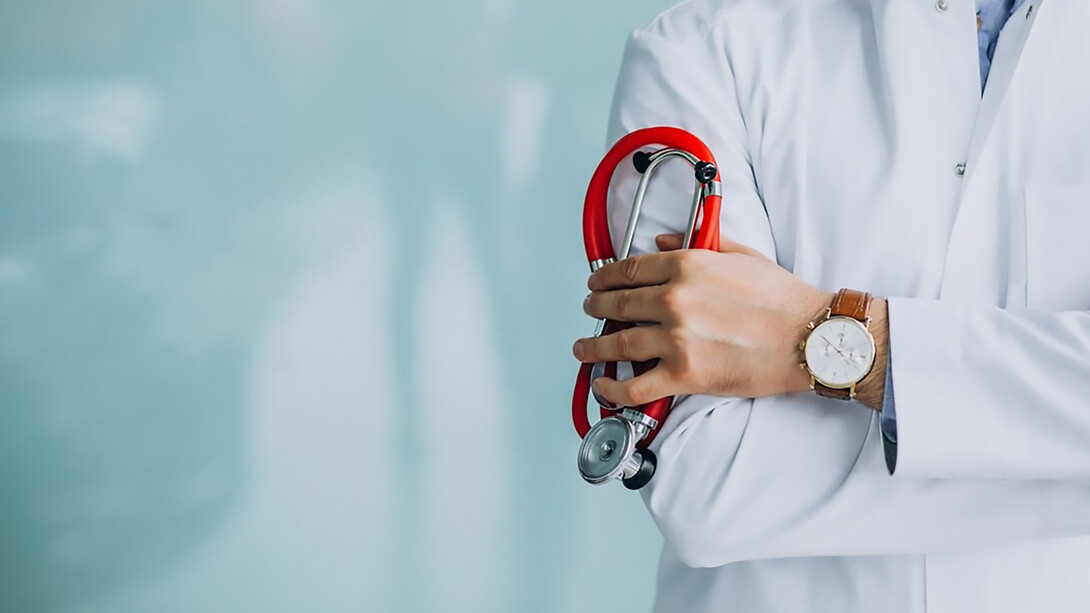 A physician in a medical robe with a stethoscope, embodying the principles of medical ethics, healthcare, and empathy