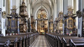 St. Catherine's Church (Polish: Kościół św. Katarzyny, German: Katharinenkirche) is Gdańsk’s oldest church, begun in the 1220s and later expanded with Gothic chapels, a gabled roof, and vaulted ceilings, Poland