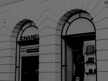 Chanel store window display with a mannequin