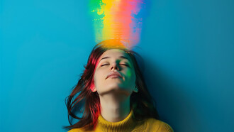 A portrait of a person with vibrant rainbow colors surrounding them, symbolizing the process of letting go of negative thoughts and embracing positivity