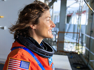 Artemis II NASA astronaut Christina Koch stands on the mobile launcher at Launch Pad 39B at Kennedy Space Center in Florida on Wednesday, September 20, during an integrated ground systems test to evaluate the crew timeline for launch day
