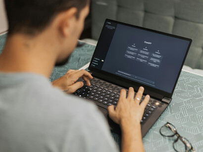 Illustration of artificial intelligence operating on a laptop, symbolizing on-device or edge AI