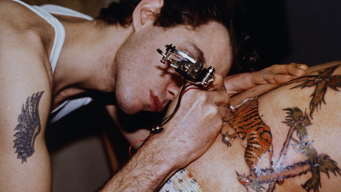 Nan Goldin, Mark tattooing Mark, Boston 1978 [from The ballad of sexual dependency] (detail), 1978. Courtesy of Tang Museum