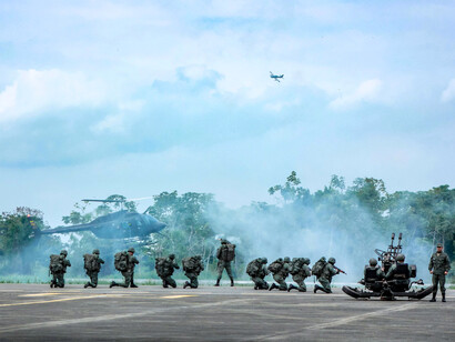 Soldiers training for combat, representing the rigorous training to prepare for the challenges ahead and their commitment to serving their country 