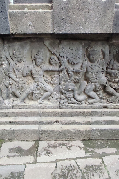 The walls are covered in bas-relief panels telling stories from the Ramayana