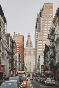 The vibrant streets of New York City, United States, come alive with the hustle and bustle of people and taxis, embodying the city's dynamic energy and allure