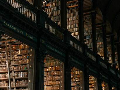 Trinity College Library in Dublin's College Green, filled with countless books and showcasing the iconic Book of Kells