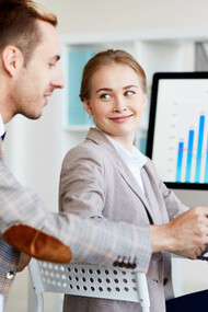Two investors analyzing the markets outcomes to invest on startups 