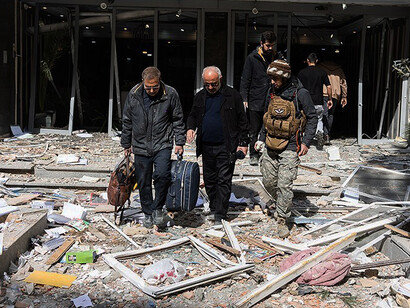A residential district in Tehran is left in ruins following the attack, Iran