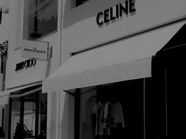 White storefronts for the luxury brands Celine and Jimmy Choo