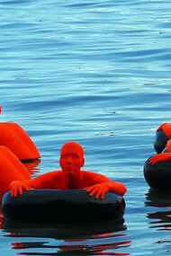 SOS by AJ Art and Design of Boston have created a floating art installation at Harbour Square Park along the inner harbour