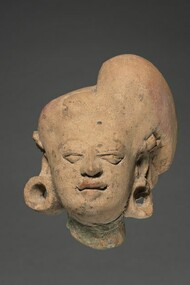 An eastern Java, Majapahit Dynasty, female head from 1978 present in Sonobudoyo Museum, Yogyakarta, Indonesia 