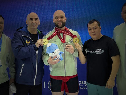 Ruslan Nurudinov competes at the Asian Weightlifting Championships in Jinju, South Korea