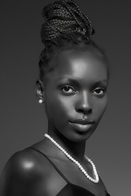 Black and white portrait of a black woman in old hollywood glamour style