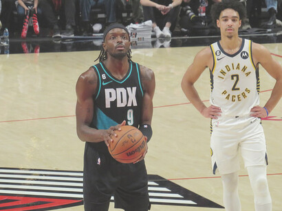 Jerami Grant (#9) of the Portland Trail Blazers prepares to shoot a free throw against the Indiana Pacers on December 5, 2022, at Moda Center Arena in Portland, Oregon