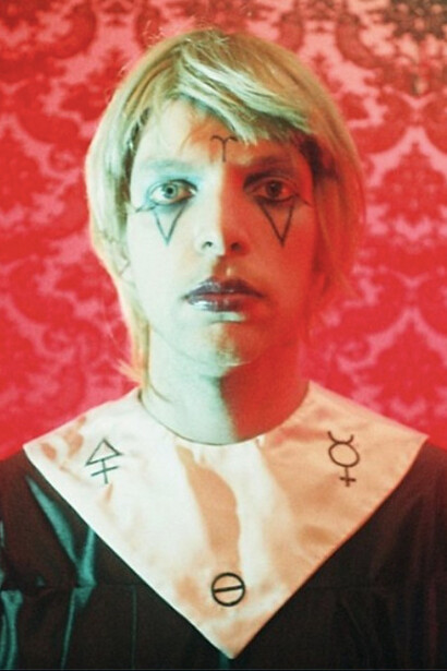 The deep red hue envelops Drab Majesty, reflecting the passion, tragedy, and surrender at the heart of the album’s unsettling themes