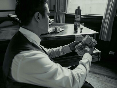 Elite power behind closed doors, where corruption thrives and money is quietly counted in private offices